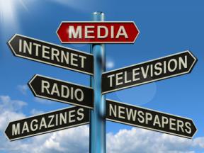 signpost listing various media types