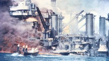  Thick smoke rolls out of a burning ship during the attack on Pearl Harbor.